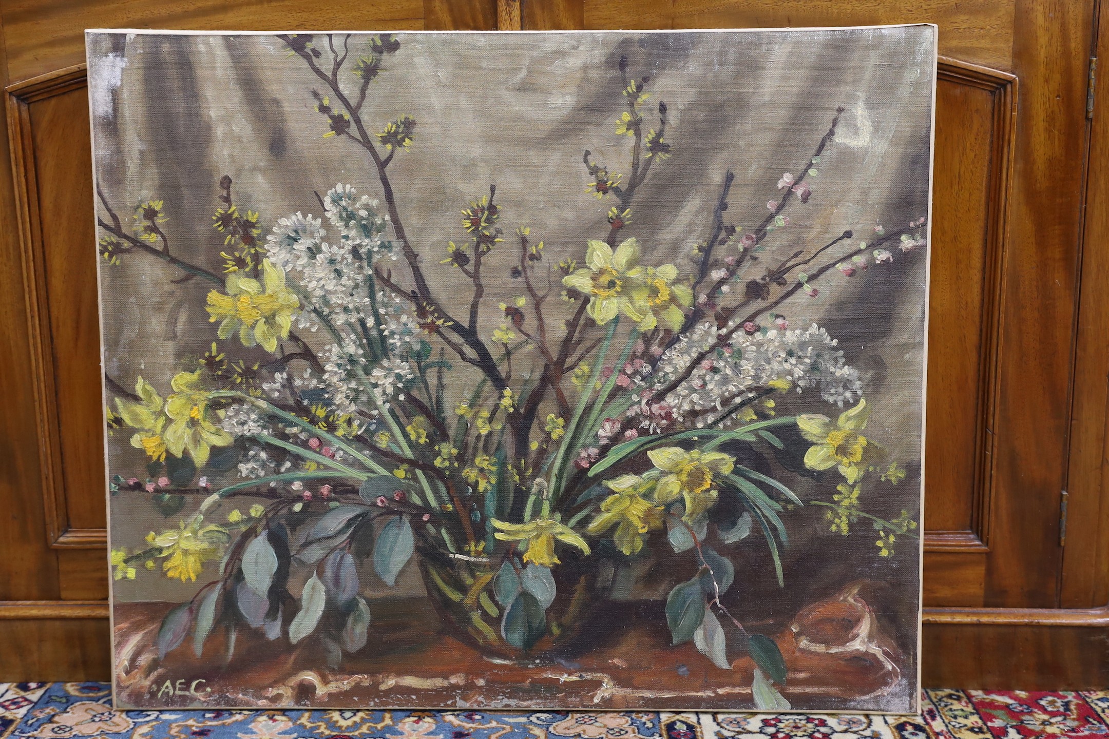 Alfred Egerton Cooper (1883-1974), Spring flowers in a vase, oil on canvas, 63 x 76cm, unframed